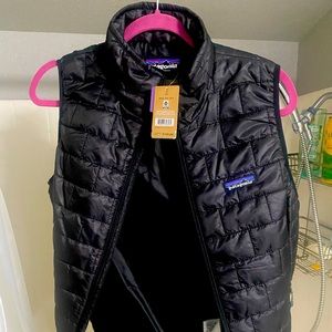 Patagonia womens vest, size medium. Brand new with tags